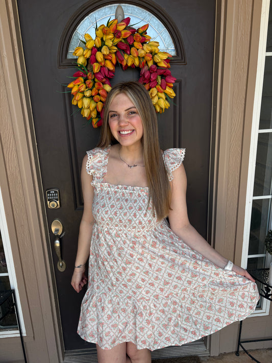 Coral floral smocked mini dress